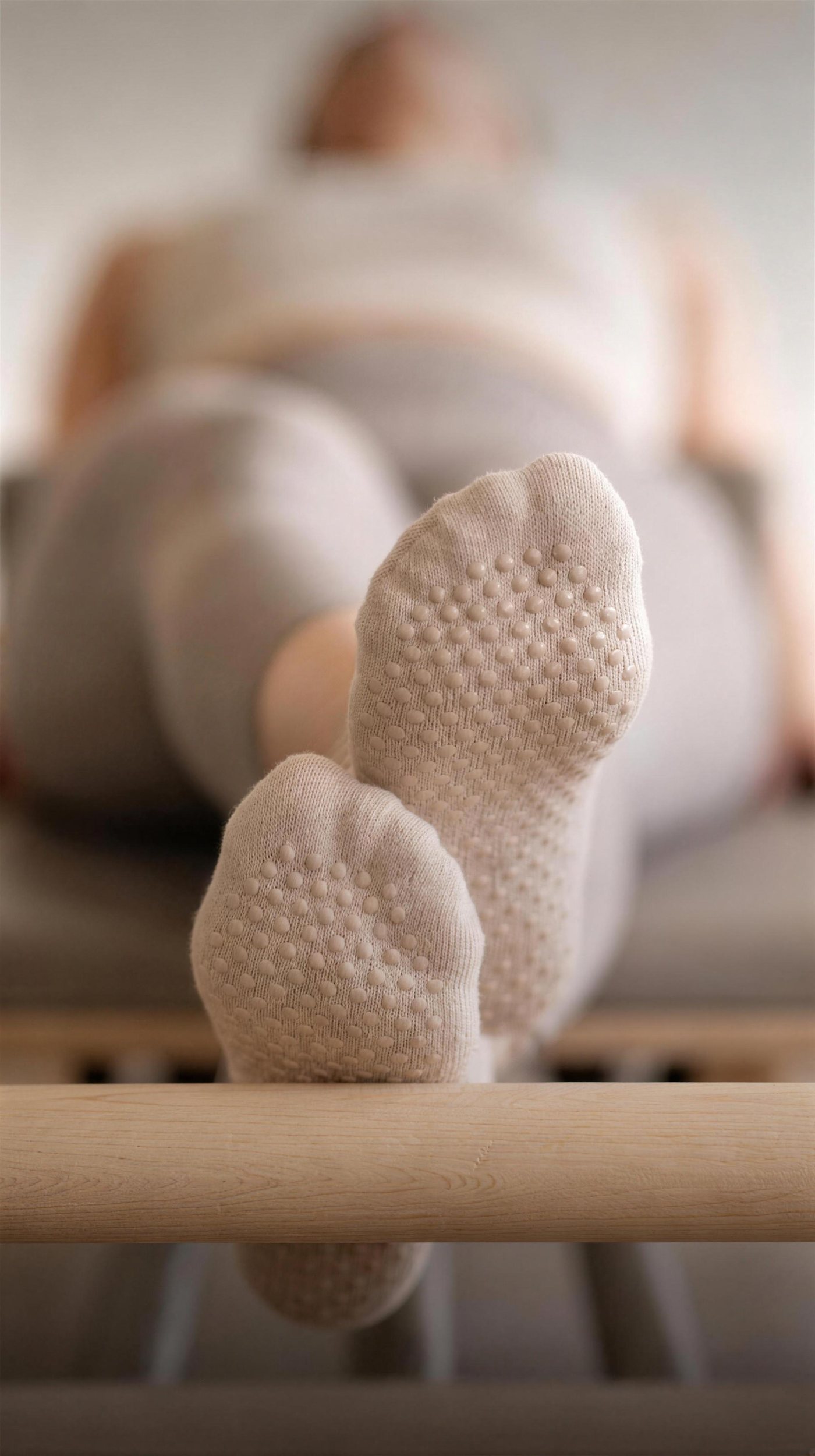 Grip-Socken auf dem Reformer: Content für Maison du Core Pilates
